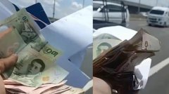 泰国高速公路出现混乱 大量现金散落在地